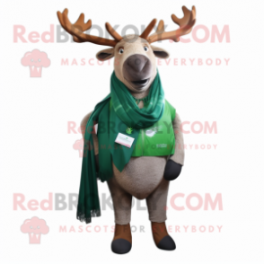 Green Elk mascot costume character dressed with a Oxford Shirt and Shawl pins