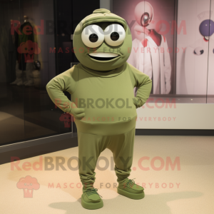 Olive Cyclops mascot costume character dressed with a Joggers and Gloves