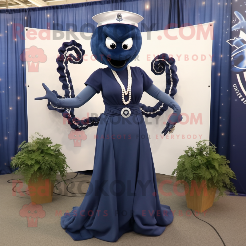 Navy Hydra mascot costume character dressed with a Maxi Dress and Necklaces