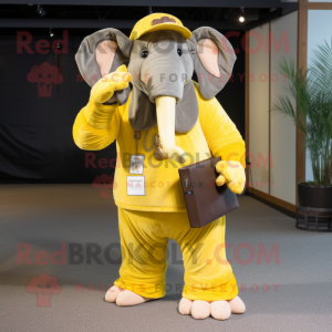 Lemon Yellow Mammoth mascot costume character dressed with a Corduroy Pants and Wallets