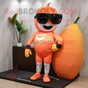 Peach Squash mascot costume character dressed with a Rash Guard and Sunglasses