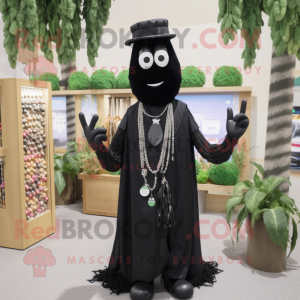 Black Asparagus mascot costume character dressed with a Dress Shirt and Necklaces