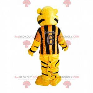 Mascote tigre com uma camisa listrada amarela e preta -