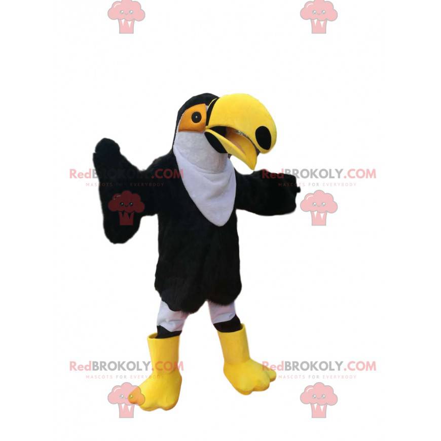 Mascote tucano preto e branco com um grande bico amarelo -