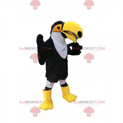 Mascote tucano preto e branco com um grande bico amarelo -
