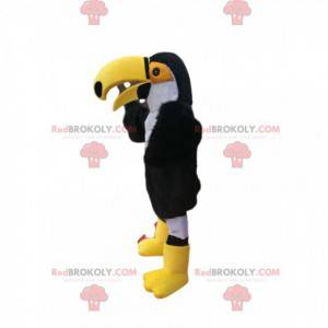 Mascote tucano preto e branco com um grande bico amarelo -