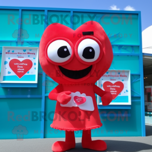 Red Love Letter mascot costume character dressed with a One-Piece Swimsuit and Coin purses