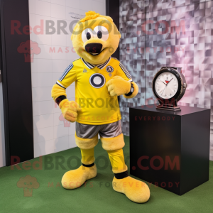 Yellow Soccer Ball mascot costume character dressed with a Corduroy Pants and Bracelet watches