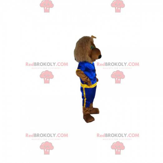 Mascota del león marrón con ropa deportiva azul y amarilla -