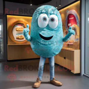 Turquoise Bagels mascot costume character dressed with a Denim Shorts and Wraps