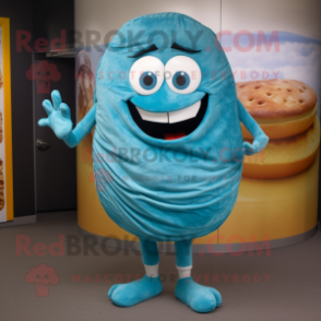 Turquoise Bagels mascot costume character dressed with a Denim Shorts and Wraps