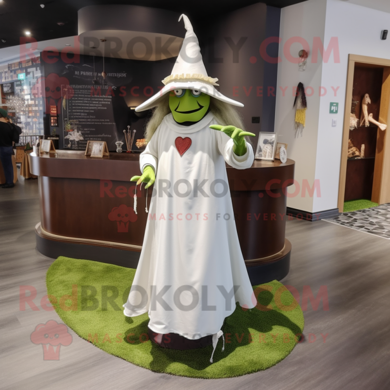 Olive Witch'S Hat mascot costume character dressed with a Wedding Dress and Tie pins Olive Witch'S Hat mascot costume character dressed with a Wedding Dress and Tie pins