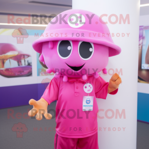 Pink Jellyfish mascot costume character dressed with a Polo Shirt and Hat pins