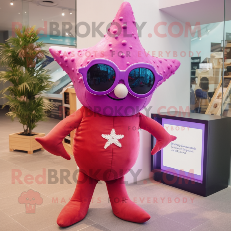 Magenta Starfish mascot costume character dressed with a Overalls and Sunglasses