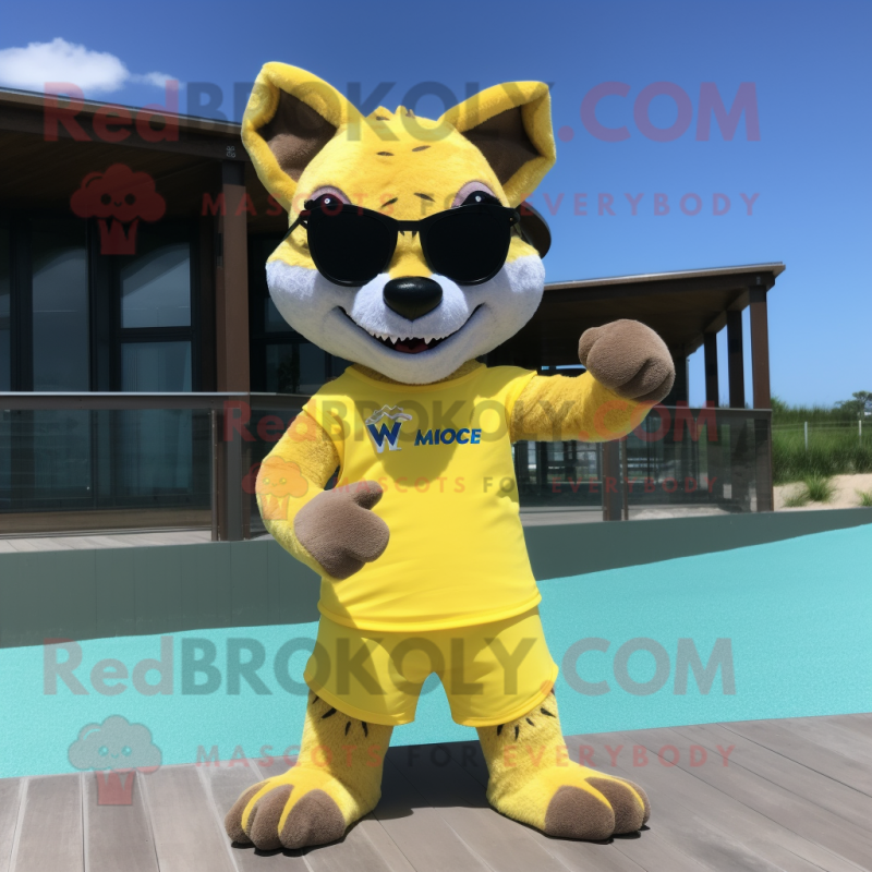 Lemon Yellow Thylacosmilus mascot costume character dressed with a Swimwear and Sunglasses