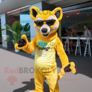 Lemon Yellow Thylacosmilus mascot costume character dressed with a Swimwear and Sunglasses