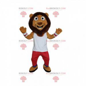 Mascote cômico do leão, com roupas esportivas vermelhas e