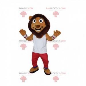 Mascota de león cómico, con ropa deportiva roja y blanca. -