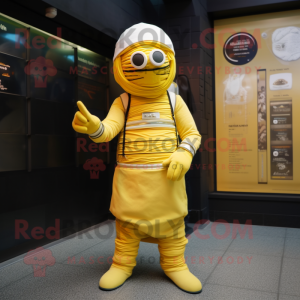 Lemon Yellow Mummy mascot costume character dressed with a Trousers and Berets