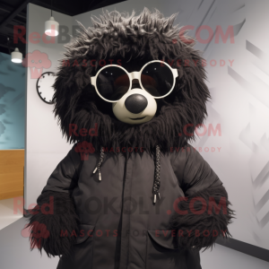 Black Meatballs mascot costume character dressed with a Parka and Sunglasses