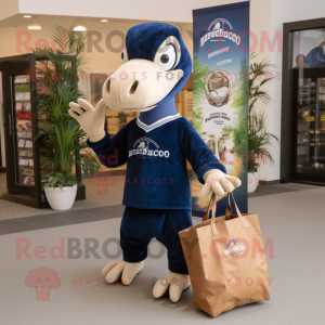 Navy Deinonychus mascot costume character dressed with a Sweater and Tote bags