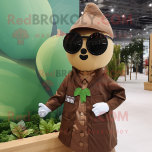 Brown Pear mascot costume character dressed with a Playsuit and Sunglasses