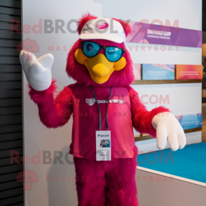 Magenta Bald Eagle mascot costume character dressed with a Swimwear and Caps