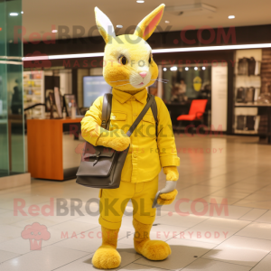 Yellow Wild Rabbit mascot costume character dressed with a Skinny Jeans and Messenger bags