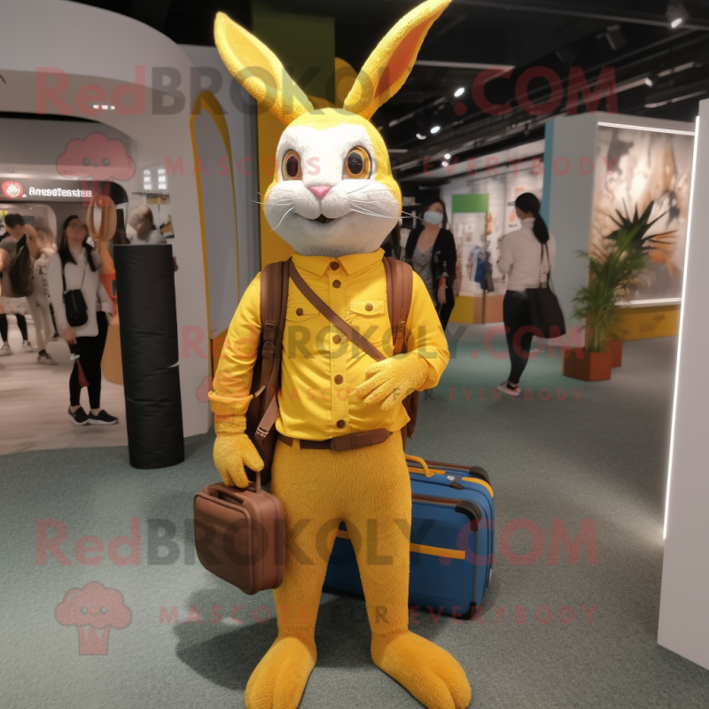 Yellow Wild Rabbit mascot costume character dressed with a Skinny Jeans and Messenger bags