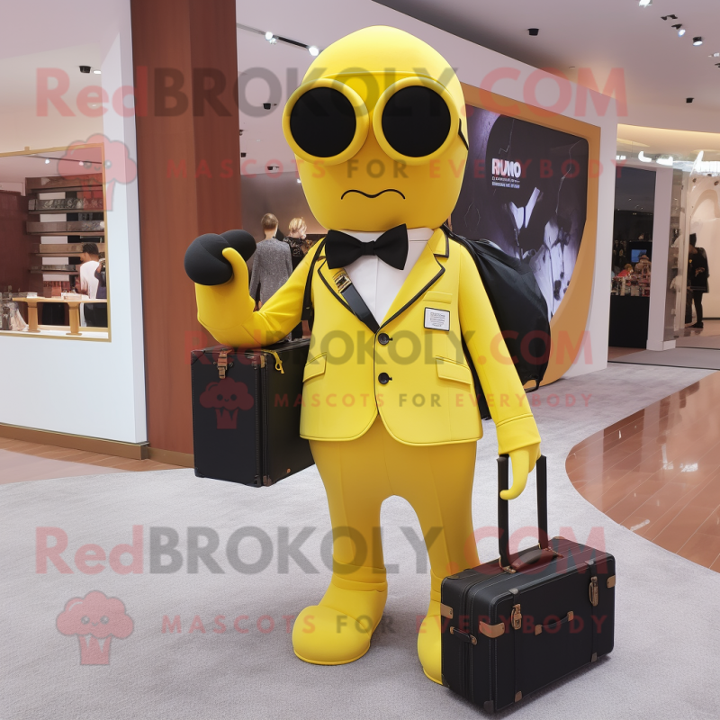 Yellow Camera mascot costume character dressed with a Suit Pants and Handbags