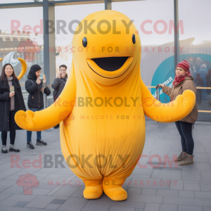 Gold Whale mascot costume character dressed with a Long Sleeve Tee and Mittens