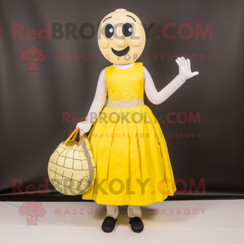 Lemon Yellow Mime mascot costume character dressed with a Ball Gown and Tote bags