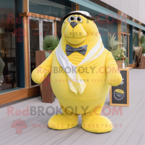 Lemon Yellow Walrus mascot costume character dressed with a Maxi Skirt and Bow ties