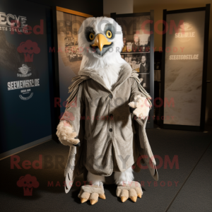 Silver Eagle mascot costume character dressed with a Jacket and Shawls