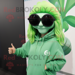 Green Queen mascot costume character dressed with a Sweatshirt and Sunglasses