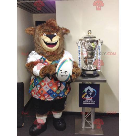 Brown bear mascot all hairy with a colorful sports outfit -