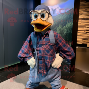 Blue Muscovy Duck mascot costume character dressed with a Flannel Shirt and Pocket squares