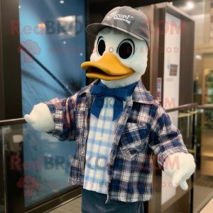Blue Muscovy Duck mascot costume character dressed with a Flannel Shirt and Pocket squares