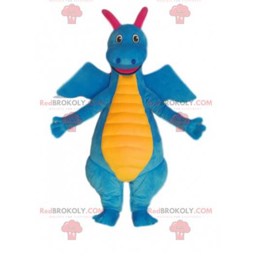 Mascote de dinossauro azul e amarelo muito sorridente. -