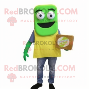 Lime Green Grilled Cheese Sandwich mascot costume character dressed with a Dungarees and Reading glasses