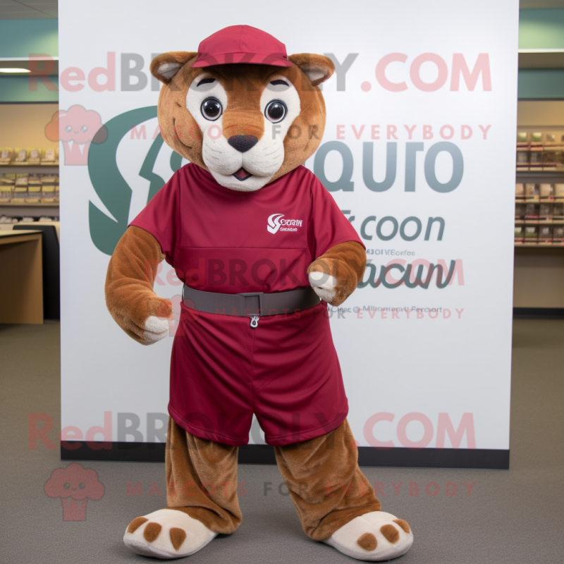 Maroon Mountain Lion mascot costume character dressed with a Wrap Skirt and Caps Maroon Mountain Lion mascot costume character dressed with a Wrap Skirt and Caps