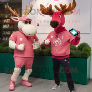 Pink Irish Elk mascot costume character dressed with a Sweatshirt and Smartwatches