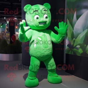Green Momentum mascot costume character dressed with a Playsuit and Gloves
