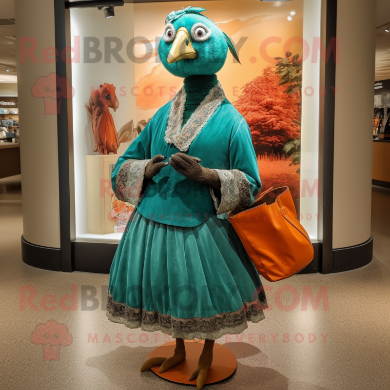 Teal Pheasant mascot costume character dressed with a Empire Waist Dress and Clutch bags Teal Pheasant mascot costume character dressed with a Empire Waist Dress and Clutch bags