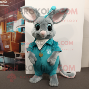Teal Chinchilla mascot costume character dressed with a Long Sleeve Tee and Tie pins