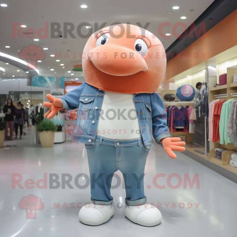 Peach Humpback Whale mascot costume character dressed with a Jeans and Rings