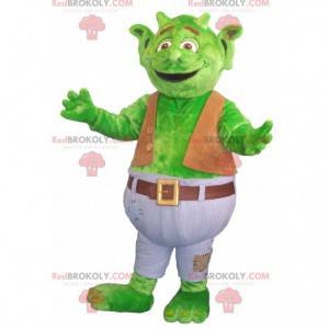 Mascotte de gros dragon vert avec une tenue blanche et marron -