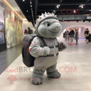 Silver Glyptodon mascot costume character dressed with a Jumpsuit and Messenger bags