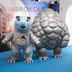 Silver Glyptodon mascot costume character dressed with a Jumpsuit and Messenger bags