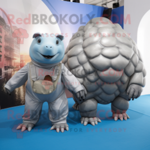 Silver Glyptodon mascot costume character dressed with a Jumpsuit and Messenger bags